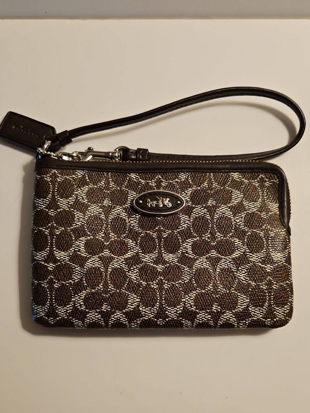 Coach Brown Pebbled leather Signature C Wristlet 6" X 4"